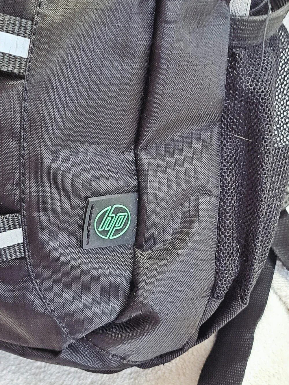 HP Black Laptop Backpack with Green Accents